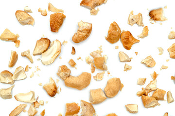 broken roasted cashew nuts isolated on white background