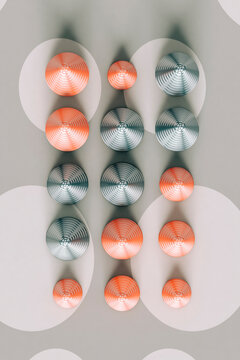 Three dimensional render of red and gray cones laid on polka dot pattern