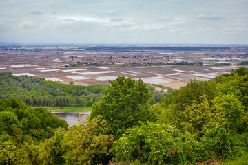 Obraz premium View of the Padana Po Valley, from the Monferrato hills, during springtime. Piedmont, Northern Italy, Alessandria Province.