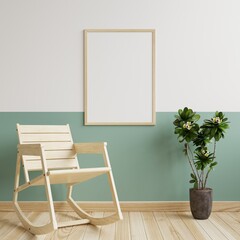Photo frame mockup on a white and green wall in the living room. With rocking chairs and plant pots on the wooden floor.3d rendering.
