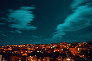 Cloudy night sky over the city