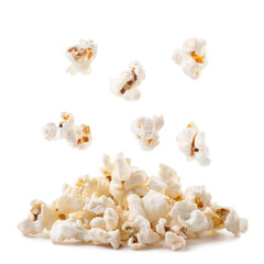 Popcorn falls on a heap on a white background. Isolated