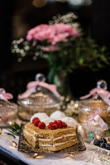 cakes on a silver tray. out of focus background