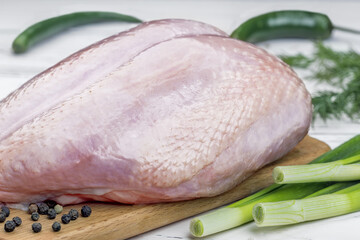 fresh chicken breast with herbs and pepper