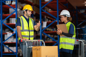 business warehouse logistic concept. people working in factory warehouse