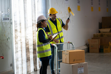 business warehouse logistic concept. people working in factory warehouse