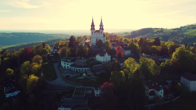 Linz, Austria - May 08 2021 P&ouml;stlingberg Church. Aerial view of Church. Historic monument and religious building
