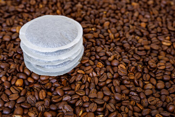 coffee beans and coffee pads