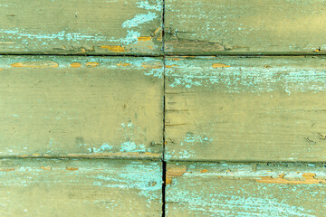 Wooden planks painted green.