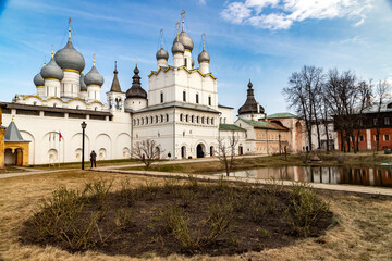 Fototapeta na wymiar The Assumption Cathedral in Rostov the Great on a sunny day on the territory of the white stone Kremlin.