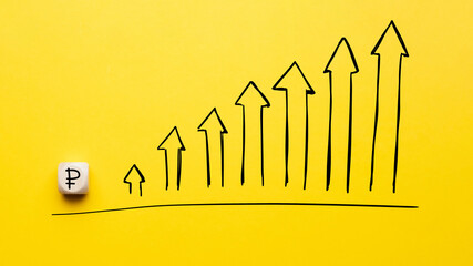 Obraz na płótnie Canvas ruble currency growth concept with drawn up arrow on chart