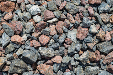 Crushed close up different stone texture background