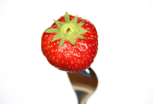 Strawberry in fork