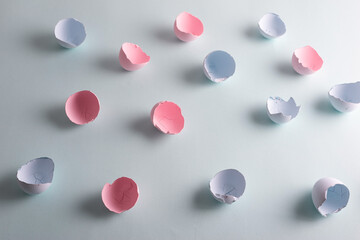 minimalistic easter concept. Eggshell painted pink and blue, background