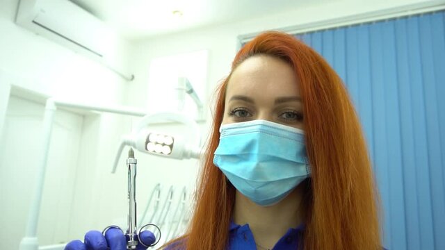Slow Motion dental anesthesia syringe injection in Dentist's hand with macro dro