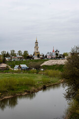 city views of the old kremlin churches and the monastery of the city of Suzdal during the rain