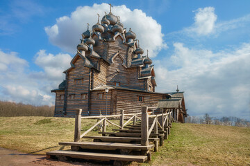 steep wooden staircase leading to a historic wooden church in the suburbs of the Russian city of...