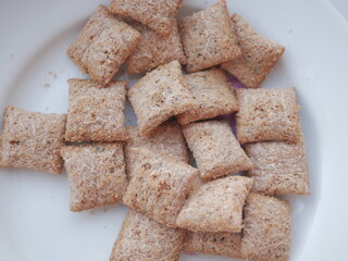 Pillow cookies on a white plate