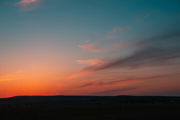 Fototapeta na wymiar Scarlet sunset over the mountains.