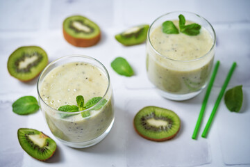 Kiwi banana smoothie in a glass