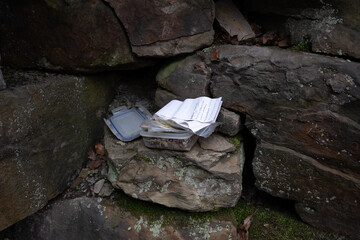 A found geocache container hidden in a wall in Wigan, Greater Manchester