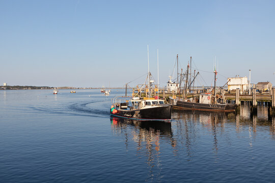 View To Ships From Pier In Provincetown In Sunset