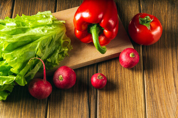 Set of vegetables for a salad diet. Cooking salad in the restaurant kitchen. Free advertising space