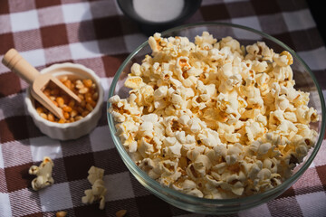 Close up delicious fresh buttery popcorn in a bowl