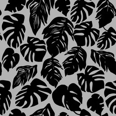 Trendy vector monochrome seamless pattern with silhouettes of black tropical leaves for apparel fabric, trendy package, wallpaper, accessories design , clothe textile, print.
