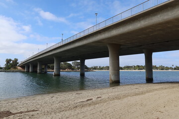 Bridge Over an Inlet to Mission Bay Transporting Cars and Other Vehicles with Concrete Pilings Very Clear