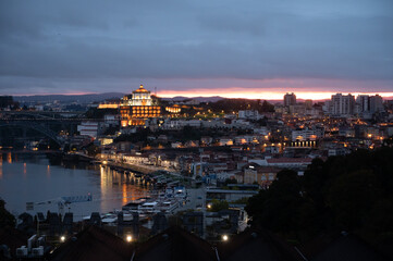 Fototapeta na wymiar Panoramic view on Douro river and old part of Porto city in Portugal at night
