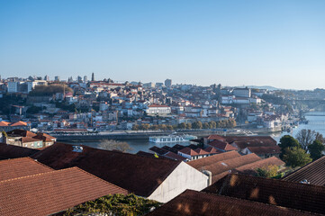 Panoramic view on old part of Porto and porto loges of Vila Nova de Gaia in Portugal at sunrise