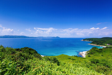Fototapeta premium Beautiful summer landscape with Furugelm island. View from above. A beautiful bay of a protected island in the summer. The beautiful coast of the protected island against the backdrop of the blue sea.