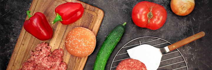 Raw Ingredients for Preparing Homemade Cheese Burger or Sandwich on Isolated Black Background, Top View. Overhead View. Homemade Preparation Snack Food for Family Party.