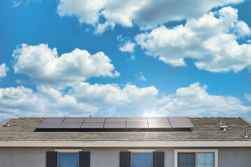 Solar roof installed on top of a new modern residential home in California, absorbing in the sun...