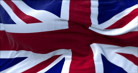 close up view of the United Kingdom flag waving in the wind