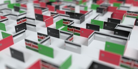 Flag of Kenya on the mockup credit card maze. Financial difficulties related 3D rendering