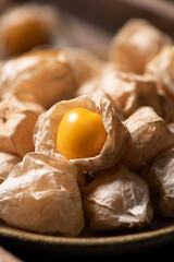 Physalis berry  background. Fresh golden Physalis (Cape gooseberry) close up