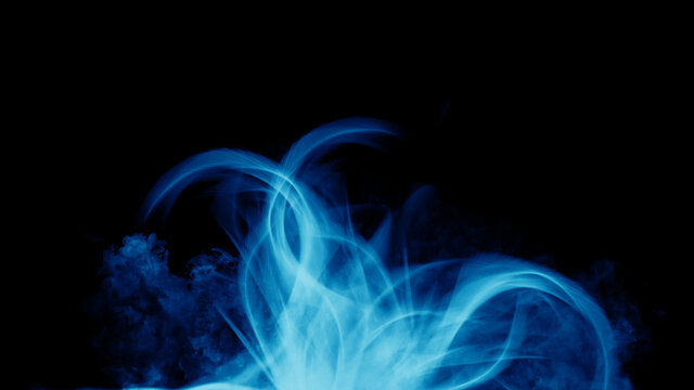 Magic blue fire on isolated background. Perfect explosion effect for decoration and covering on black background. Concept burn flame and light texture overlays.