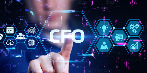 Business, Technology, Internet and network concept. Young businessman working on a virtual screen of the future and sees the inscription: CFO
