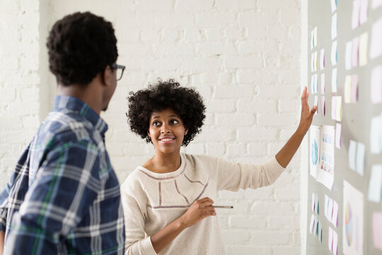 Two colleagues working in creative studio