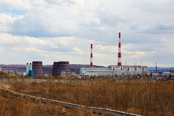 Fototapeta na wymiar Industrial zone. Thermal power plant. Heating of the city. Environmental pollution, an environmental problem.