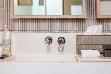 Modern cream marble sink in a luxurious bathroom