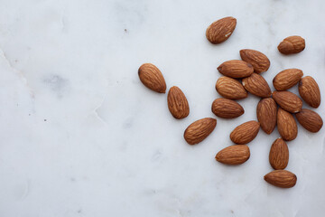 Almonds and white marble  tray