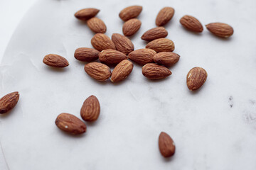 Almonds and white marble  tray