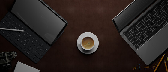 3D rendering, flat lay of workspace with laptop, tablet, accessories and coffee cup on brown leather desk