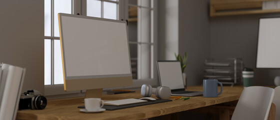 3D rendering, side view of computer monitor with mock-up screen and office supplies on wooden table in office workspace