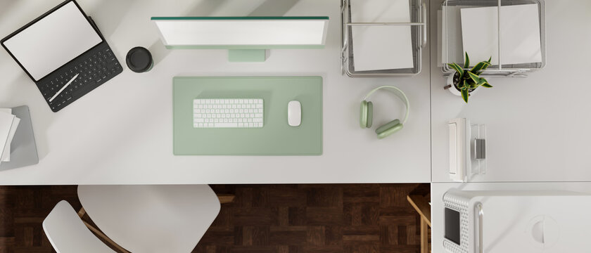 3D rendering, top view of office workspace with computer, digital tablet and office supplies on the table