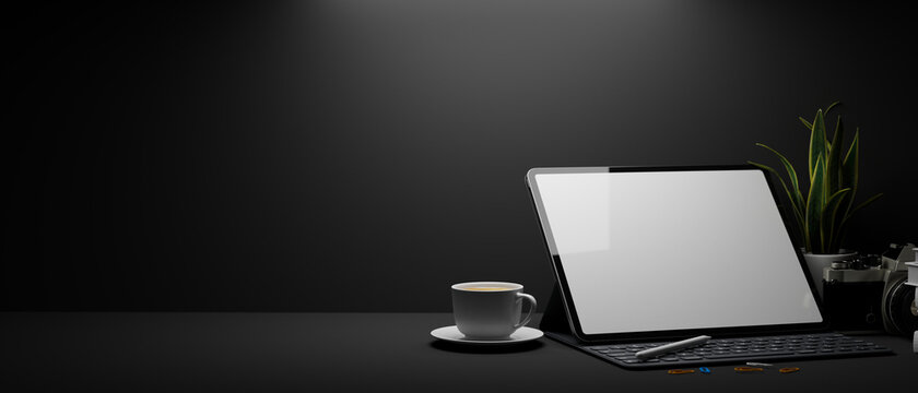 3D rendering, dark working space with mock-up laptop, cup, supplies and copy space