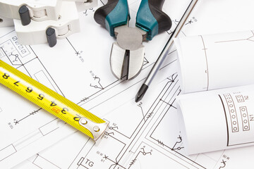 Work tools, electric fuse and diagrams of housing plan with electrical installation. Building home